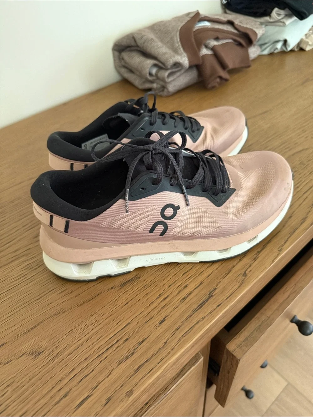On Running Women’s Pink and Black Cloudsurfer Sneakers